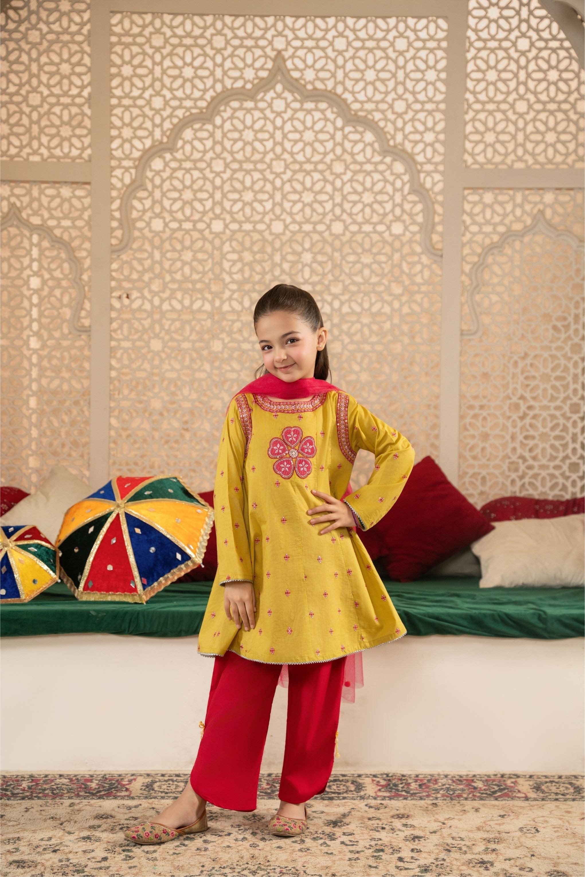 Mustard Yellow Embroidered Kurti with Pink Salwar Set